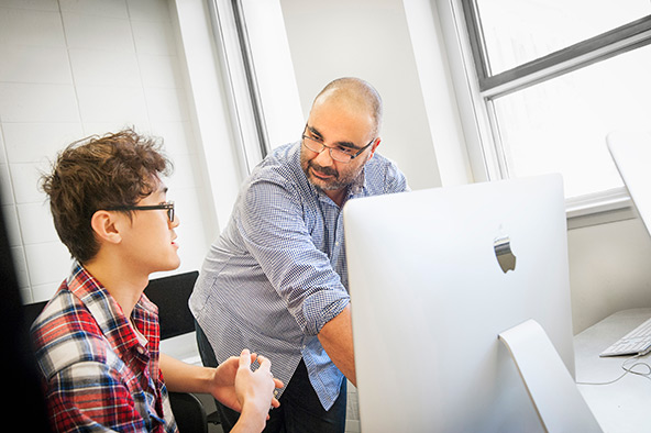 Dr. Bentabet teaching a student